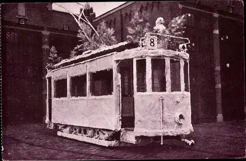 Ak Scheveningen Den Haag Südholland, De Winter, geschmückte Straßenbahn