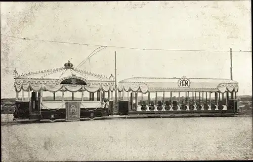 Ak Scheveningen Den Haag Südholland, De Salonwaggen met Aanhangwagen, geschmückte Straßenbahn