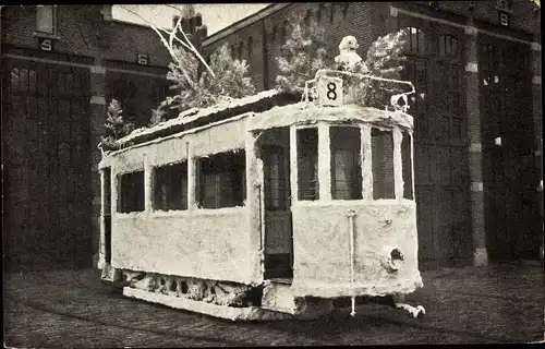Ak Scheveningen Den Haag Südholland, De Winter, geschmückte Straßenbahn