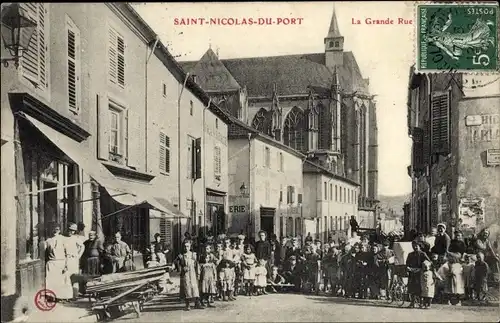 Ak Saint Nicolas du Port Meurthe et Moselle, La Grande Rue, Passanten, Geschäfte