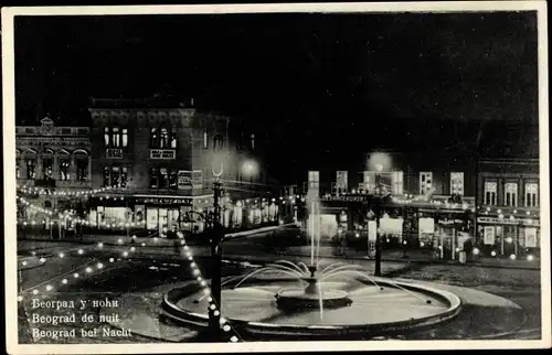 Ak Beograd Belgrad Serbien, Stadtbild bei Nacht, Brunnen