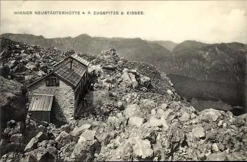 Ak Wettersteingebirge, Wiener Neustädter Hütte, auf der Zugspitze gegen Eibsee