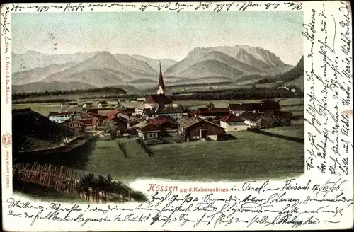 Ak Kössen in Tirol, gg. d. Kaisergebirge, Panorama mit Kirchturm