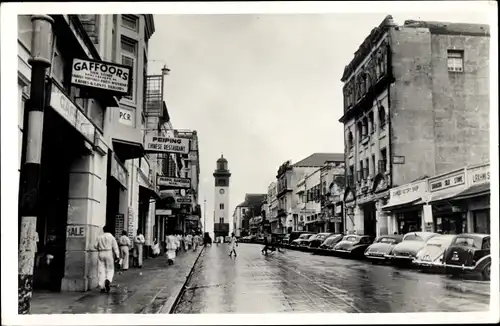 Ak Colombo Ceylon Sri Lanka, Straßenpartie, Autos, Passanten, Geschäfte