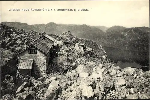 Ak Wettersteingebirge, Wiener Neustädter Hütte, auf der Zugspitze gegen Eibsee