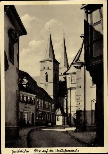 Ak Gerolzhofen in Unterfranken, Blick auf die Stadtpfarrkirche, Straßenansicht