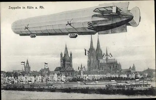 Ak Köln am Rhein, Zeppelin über der Stadt, Dom