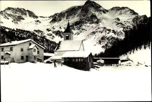 Ak Sulden Solda Stilfs Stelvio Südtirol, Winteransicht, Ortsansicht mit Kirche