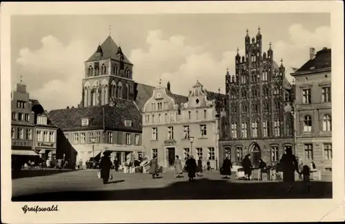 Ak Hansestadt Greifswald, Platz der Freundschaft, Straßenszene