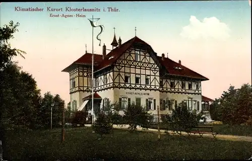 Ak Bad Klosterlausnitz in Thüringen, Ernst Agnes Heim, Gartenpartie, Fahne am Mast