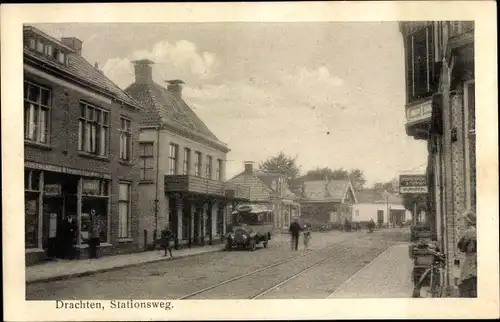 Ak Dragten Drachten Friesland Niederlande, Stationsweg, Autobus, Geschäfte