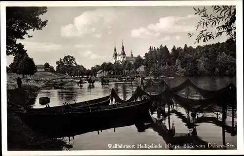 Ak Święta Lipka Heiligelinde Ostpreußen, Blick vom Dainova See zur Kirche, Fischernetze