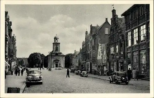 Ak Husum in Nordfriesland, Großestraße mit Blick auf die Kirche, Autos