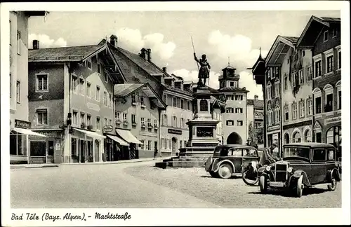 Ak Bad Tölz in Oberbayern, Markstraße, Denkmal, Fahrzeuge