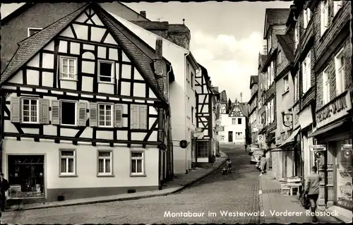 Ak Montabaur im Westerwald, Vorderer Rebstock, Straße mit Fachwerkhäusern