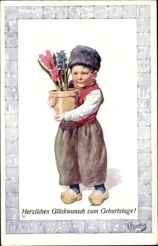 Künstler Ak Feiertag, Karl, Glückwunsch Geburtstag, Junge in niederländischer Tracht, Blumen