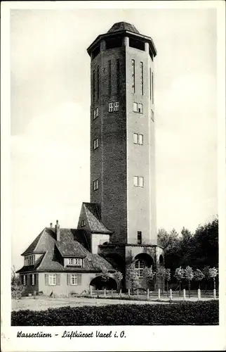 Ak Varel am Jadebusen, Straßenpartie mit Blick auf den Wasserturm