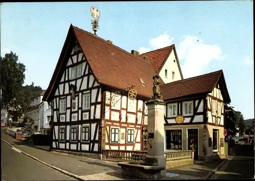 Ak Bad Orb in Hessen, Wendelinusbrunnen, Fachwerkhaus