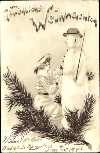 Ak Glückwunsch Weihnachten, Frau baut einen Schneemann