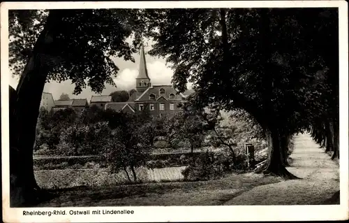 Ak Rheinberg am Niederrhein, Ostwall mit Lindenallee, Kirche