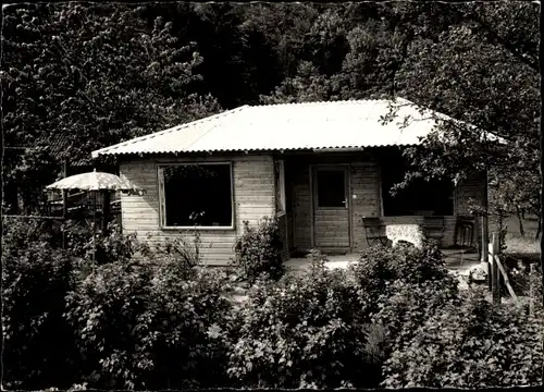 Ak Bad Pyrmont in Niedersachsen, Holzhaus, Bungalow, Garten