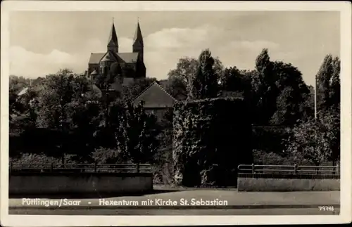 Ak Püttlingen im Saarland, Hexenturm mit Kirche St. Sebastian