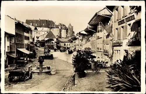 Ak Gruyères Kanton Freiburg Schweiz, Straßenpartie, Hotel
