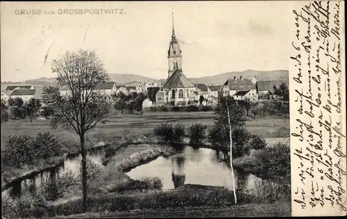 Ak Großpostwitz in Sachsen, Totalansicht der Ortschaft, Kirche