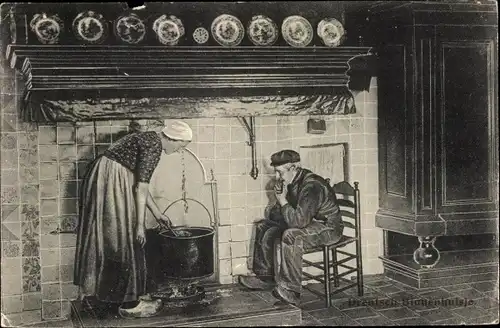 Ak Drenthe Niederlande, Mann und Frau in Tracht an der Kochstelle