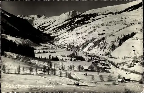 Ak Saalbach Hinterglemm in Salzburg, Ort im Tal, Winter