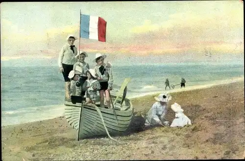 Ak Niederlande, Kinder mit Ruderboot am Strand