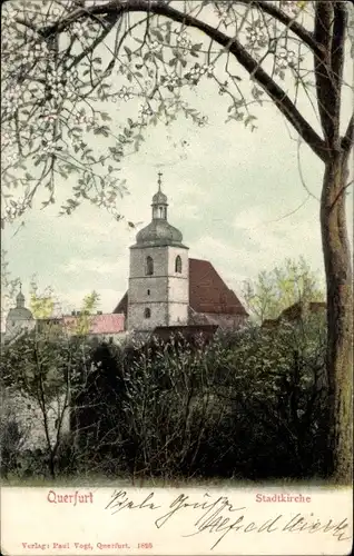 Ak Querfurt in Sachsen Anhalt, Stadtkirche, Außenansicht, blühender Baum