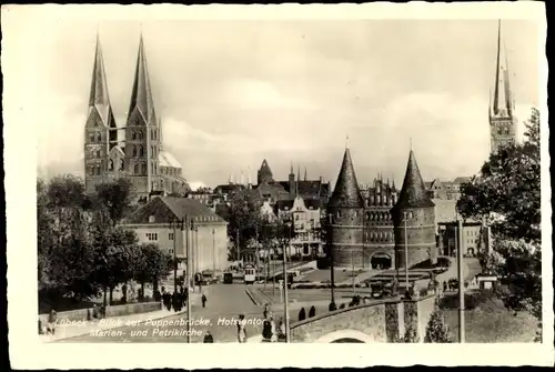 Ak Hansestadt Lübeck, Puppenbrücke, Holstentor, Marien- und Petrikirche