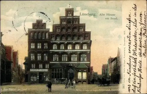 Ak Lüneburg in Niedersachsen, Blick auf alte Häuser am Sand, Geschäft, Inh. Friedrich Hermann