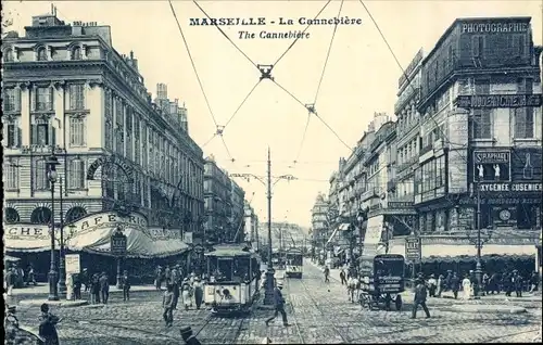 Ak Marseille Bouches du Rhône, La Canebière, Straßenbahnen, Geschäfte
