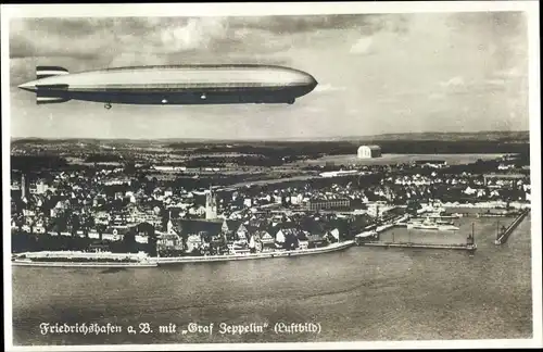 Ak Friedrichshafen am Bodensee, Luftschiff LZ 127 Graf Zeppelin, Gesamtansicht der Stadt