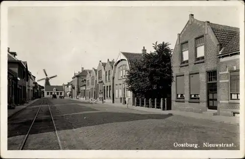 Ak Oostburg Zeeland, Nieuwstraat, Windmolen