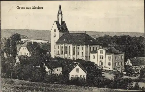 Ak Mochau in Mittelsachsen, Teilansicht der Ortschaft mit Kirche