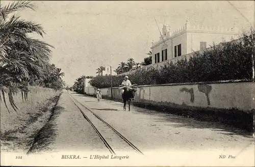 Ak Biskra Algerien, L'Hôpital Lavigerie, Mann mit Feuerholz auf einem Esel