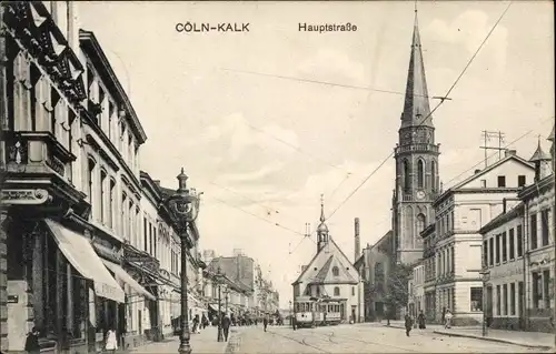 Ak Kalk Köln Nordrhein Westfalen, Hauptstraße, Straßenpartie, Kirche, Straßenbahn