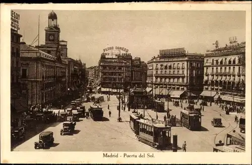 Ak Madrid Spanien, Puerta del Sol, Straßenbahn, Autos, Pedro Domeco
