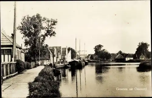 Ak Ossenzijl Overijssel, Teilansicht, Straßenpartie am Wasser