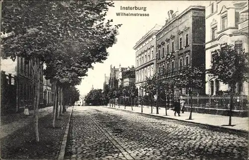 Ak Tschernjachowsk Insterburg Ostpreußen, Wilhelmstraße, Pflasterweg, Wohnhäuser