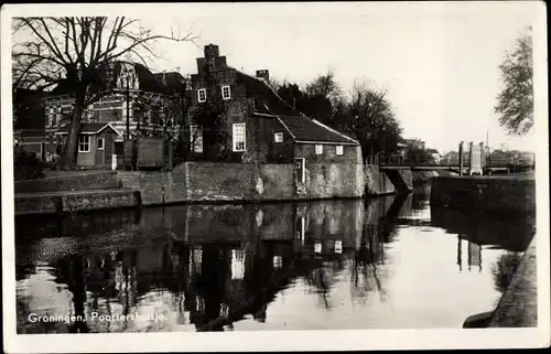 Ak Groningen Niederlande, Poortiershuisje, Häuser am Wasser