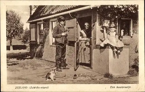 Ak Zeeland Niederlande, Een buurptaatje, Dorfleben, Niederländische Tracht, Katze, Familie