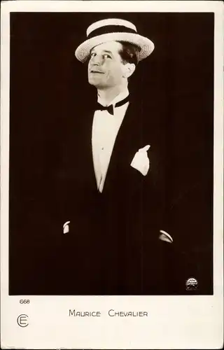 Ak Schauspieler Maurice Chevalier, Portrait im Anzug mit Hut