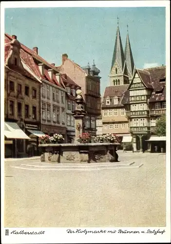 Ak Halberstadt in Sachsen Anhalt, Der Holzmarkt mit Brunnen und Stelzfuß, Fachwerkhäuser