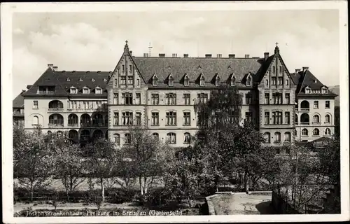 Ak Freiburg im Breisgau, St. Josephs Krankenhaus, Gartenseite
