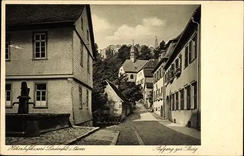 Ak Lindenfels im Odenwald, Straßenpartie mit Brunnen und Burg, Aufgang zur Burg