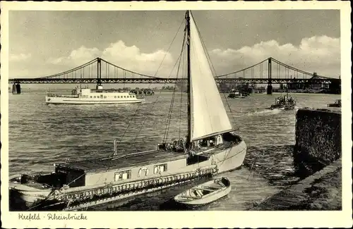 Ak Krefeld am Niederrhein, Rheinbrücke, Segelschiff, Boote